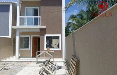 Imagem: A casa possui 3 Dormitórios, 3 Banheiros, 2 Vagas na garagem