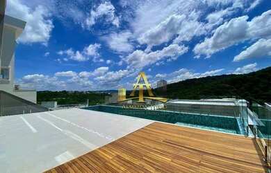 Imagem: A casa possui 4 Dormitórios, 5 Banheiros, 4 Vagas na garagem