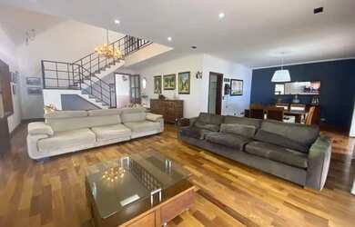 Imagem: A casa em condomínio possui 4 Dormitórios, 5 Banheiros, 4