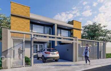 Imagem: A casa possui 3 Dormitórios, 3 Banheiros, 2 Vagas na garagem