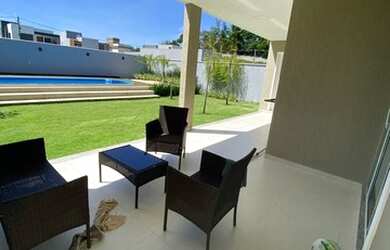 Imagem: A casa em condomínio possui 4 Dormitórios, 5 Banheiros, 2