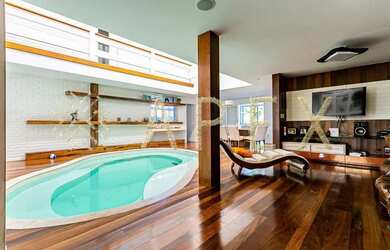 Imagem: A casa possui 5 Dormitórios, 5 Banheiros, 2 Vagas na garagem