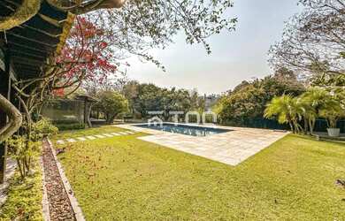 Imagem: A casa em condomínio possui 5 Dormitórios, 4 Banheiros, 5