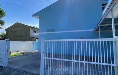 Imagem: A casa possui 2 Dormitórios, 2 Banheiros, 1 Vaga na garagem