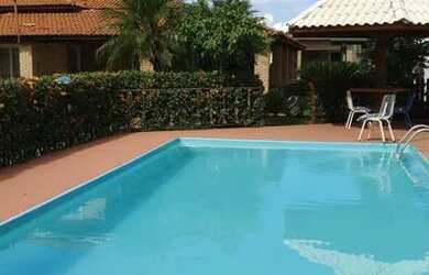 Imagem: A casa possui 3 Dormitórios, 5 Vagas na garagem e está localizado