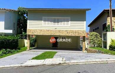 Imagem: A casa em condomínio possui 4 Dormitórios, 5 Banheiros, 5