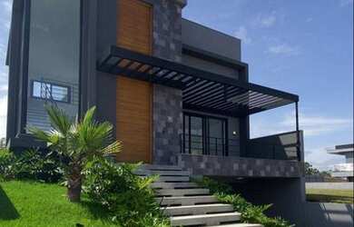 Imagem: A casa em condomínio possui 4 Dormitórios, 3 Banheiros, 4