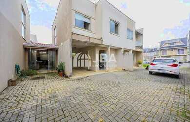 Imagem: A casa em condomínio possui 3 Dormitórios, 3 Banheiros, 2