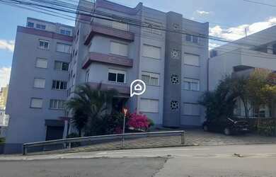 Imagem: O apartamento possui 3 Dormitórios, 1 Banheiro, 1 Vaga na garagem