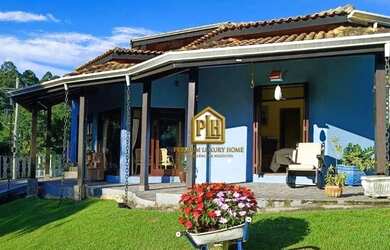 Imagem: A casa em condomínio possui 4 Dormitórios, 5 Banheiros, 4