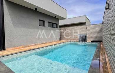 Imagem: A casa em condomínio possui 4 Dormitórios, 5 Banheiros, 2