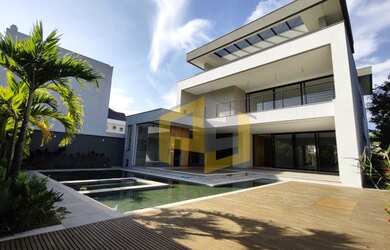 Imagem: A casa em condomínio possui 5 Dormitórios, 5 Banheiros, 4