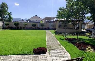 Imagem: A casa em condomínio possui 4 Dormitórios, 5 Banheiros, 2