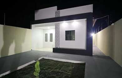 Imagem: A casa possui 4 Dormitórios, 3 Banheiros e 2 Vagas na garagem