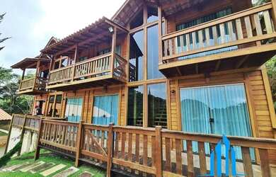 Imagem: A casa possui 5 Dormitórios, 5 Banheiros, 5 Vagas na garagem