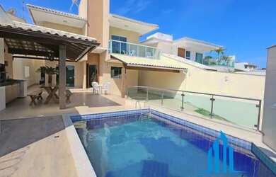 Imagem: A casa possui 4 Dormitórios, 4 Banheiros, 4 Vagas na garagem