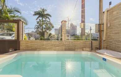 Imagem 10: Sobrado com 04 dormitórios sendo 01 suíte e 02 vagas de garagem Centro Matinhos