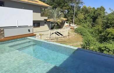 Imagem: A casa em condomínio possui 3 Dormitórios, 4 Banheiros, 2