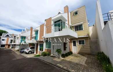 Imagem: A casa possui 2 Dormitórios, 3 Banheiros, 1 Vaga na garagem