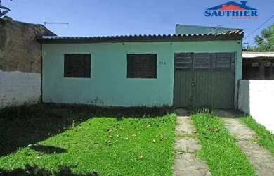 Imagem: A casa possui 2 Dormitórios, 1 Banheiro, 1 Vaga na garagem