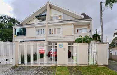 Imagem: A casa em condomínio possui 4 Dormitórios, 4 Banheiros, 4