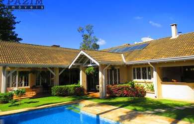 Imagem: A casa em condomínio possui 3 Dormitórios, 4 Banheiros, 386m²