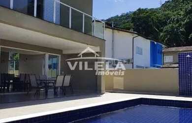 Imagem: A casa possui 3 Dormitórios, 3 Banheiros, 2 Vagas na garagem