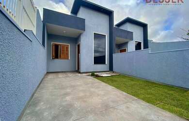 Imagem: A casa possui 2 Dormitórios, 1 Banheiro, 2 Vagas na garagem