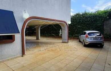 Imagem: A casa possui 5 Dormitórios, 5 Banheiros, 5 Vagas na garagem