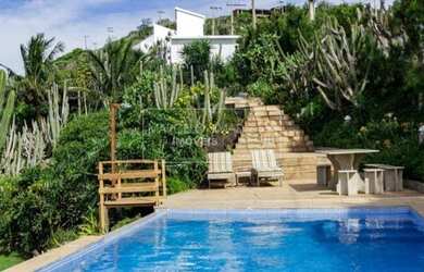 Imagem 2: Casa à venda no Pontal do Atalaia com piscina e vista para o mar