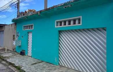 Imagem: A casa possui 2 Dormitórios, 1 Banheiro, 3 Vagas na garagem