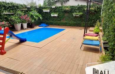 Imagem: A casa possui 5 Dormitórios, 5 Banheiros, 2 Vagas na garagem