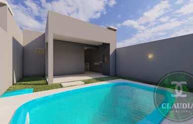 Imagem: A casa possui 3 Dormitórios, 2 Banheiros, 2 Vagas na garagem