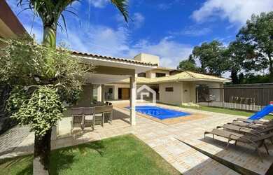 Imagem: A casa possui 5 Dormitórios, 5 Banheiros, 4 Vagas na garagem