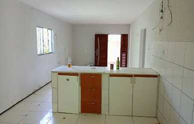 Imagem: A casa possui 4 Dormitórios, 4 Banheiros, 2 Vagas na garagem