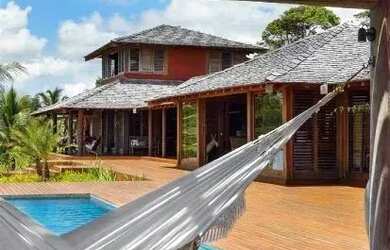 Imagem: A casa possui 5 Dormitórios, 5 Banheiros, 5 Vagas na garagem