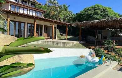 Imagem: A casa em condomínio possui 4 Dormitórios, 5 Banheiros, 2