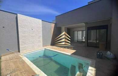 Imagem: A casa possui 3 Dormitórios, 1 Banheiro, 2 Vagas na garagem