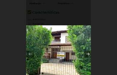 Imagem: A casa possui 4 Dormitórios, 5 Banheiros, 2 Vagas na garagem