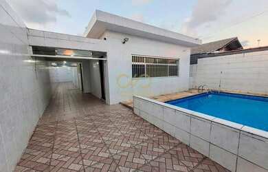 Imagem: A casa possui 4 Dormitórios, 2 Banheiros, 2 Vagas na garagem