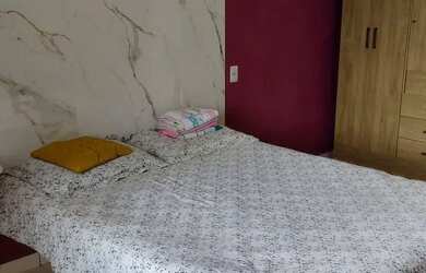 Imagem: A casa possui 2 Dormitórios, 2 Banheiros, 2 Vagas na garagem