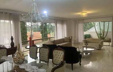 Imagem: A casa em condomínio possui 5 Dormitórios, 5 Banheiros, 4