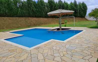 Imagem: A casa em condomínio possui 4 Dormitórios, 5 Banheiros, 5