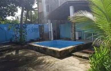 Imagem: A casa possui 3 Dormitórios e 2 Banheiros e está localizado