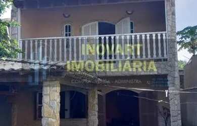 Imagem: A casa possui 3 Dormitórios, 4 Banheiros, 2 Vagas na garagem