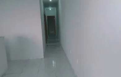 Imagem: A casa possui 3 Dormitórios, 1 Banheiro, 1 Vaga na garagem