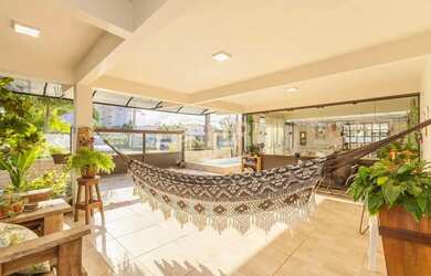 Imagem 16: Sobrado com 04 dormitórios sendo 01 suíte e 02 vagas de garagem Centro Matinhos