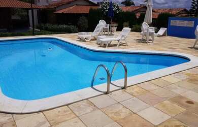 Imagem: A casa em condomínio possui 5 Dormitórios, 1 Banheiro, 2 Vagas