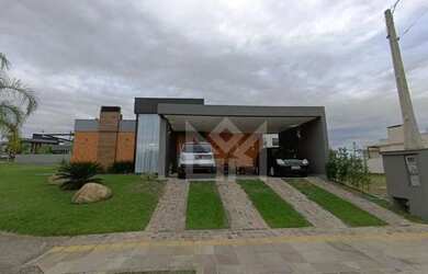 Imagem: A casa em condomínio possui 4 Dormitórios, 5 Banheiros, 2