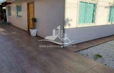 Imagem: A casa possui 3 Dormitórios, 1 Banheiro, 90m² de Área e